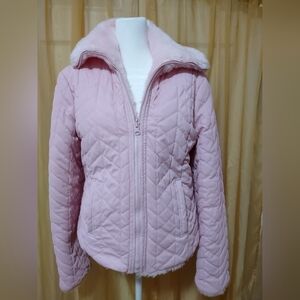 Completely reversible Women's pink faux fur winter jacket. Size Medium.